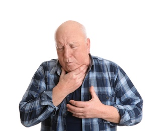 Photo of Senior man suffering from cough on white background