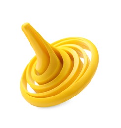Photo of One yellow spinning top on white background