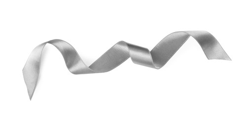 Photo of Silver satin ribbon on white background, top view
