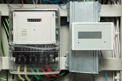 Photo of Different electric meters and wires in fuse box