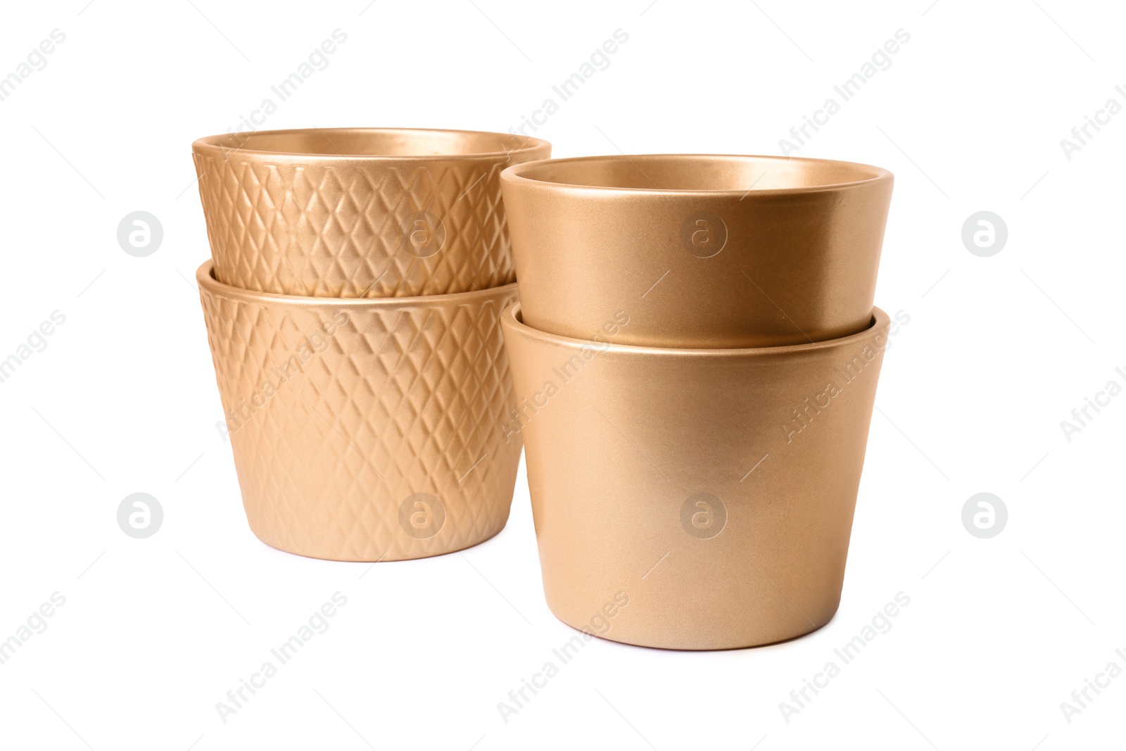 Photo of Golden empty ceramic flower pots on white background