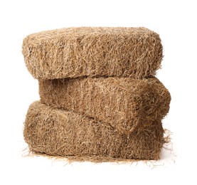 Bales of dried straw isolated on white