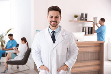 Photo of Portrait of male doctor in modern clinic