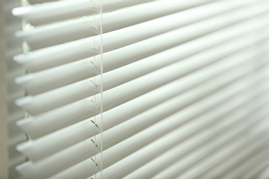 Photo of Closeup view of window with horizontal blinds