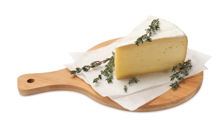 Photo of Board with piece of tasty camembert cheese and thyme isolated on white