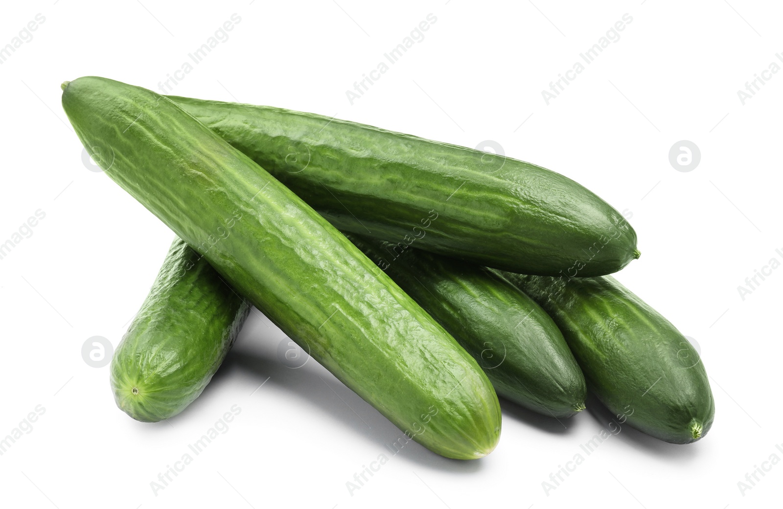 Photo of Many long fresh cucumbers isolated on white