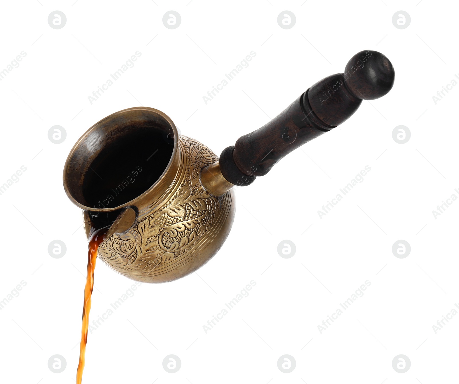 Photo of Turkish coffee. Pouring brewed beverage from cezve on white background