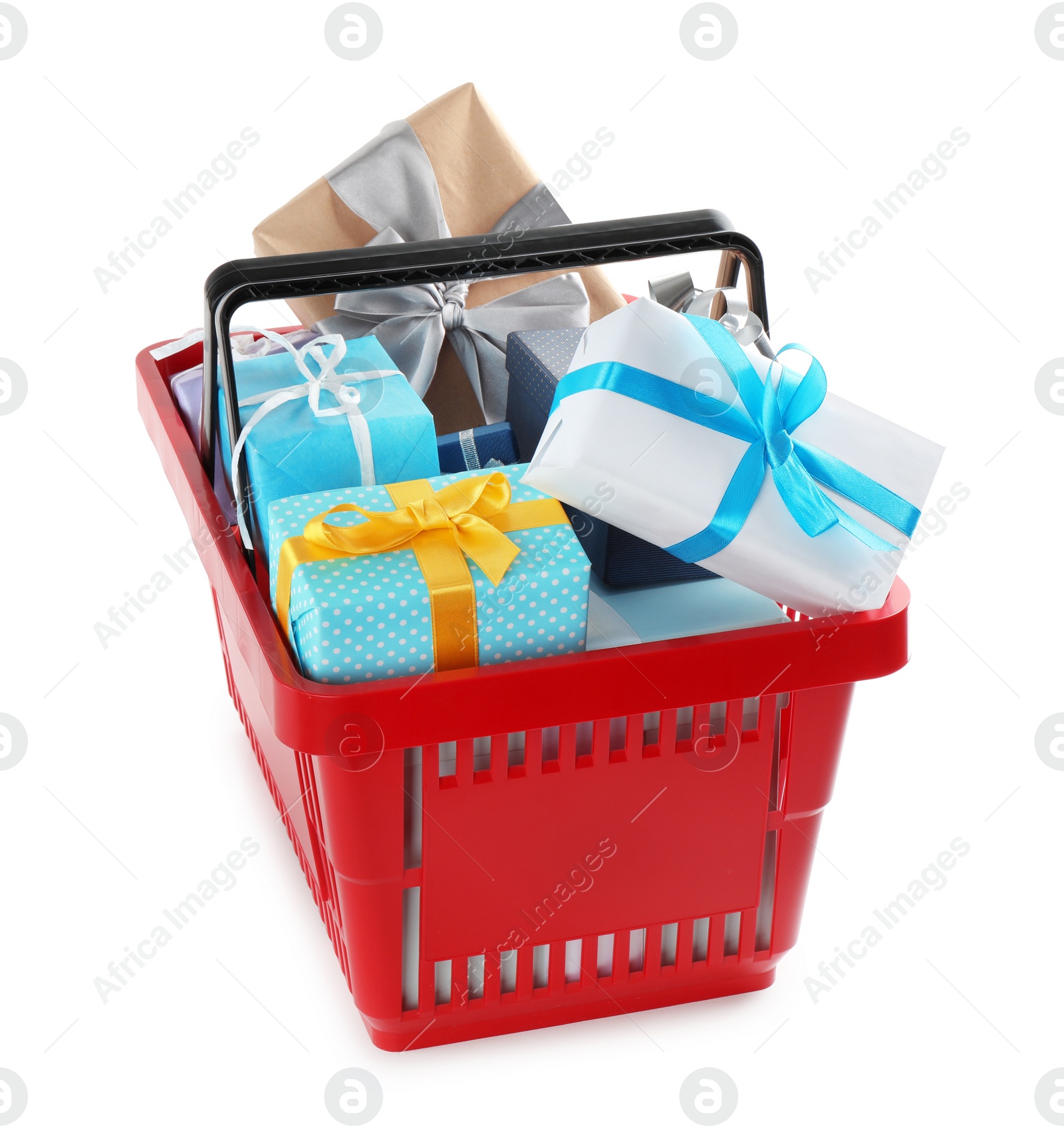 Photo of Red shopping basket with different gifts on white background