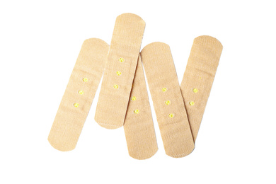 Photo of Medical sticking plasters isolated on white. First aid item