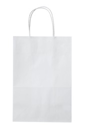 Photo of Empty shopping paper bag isolated on white