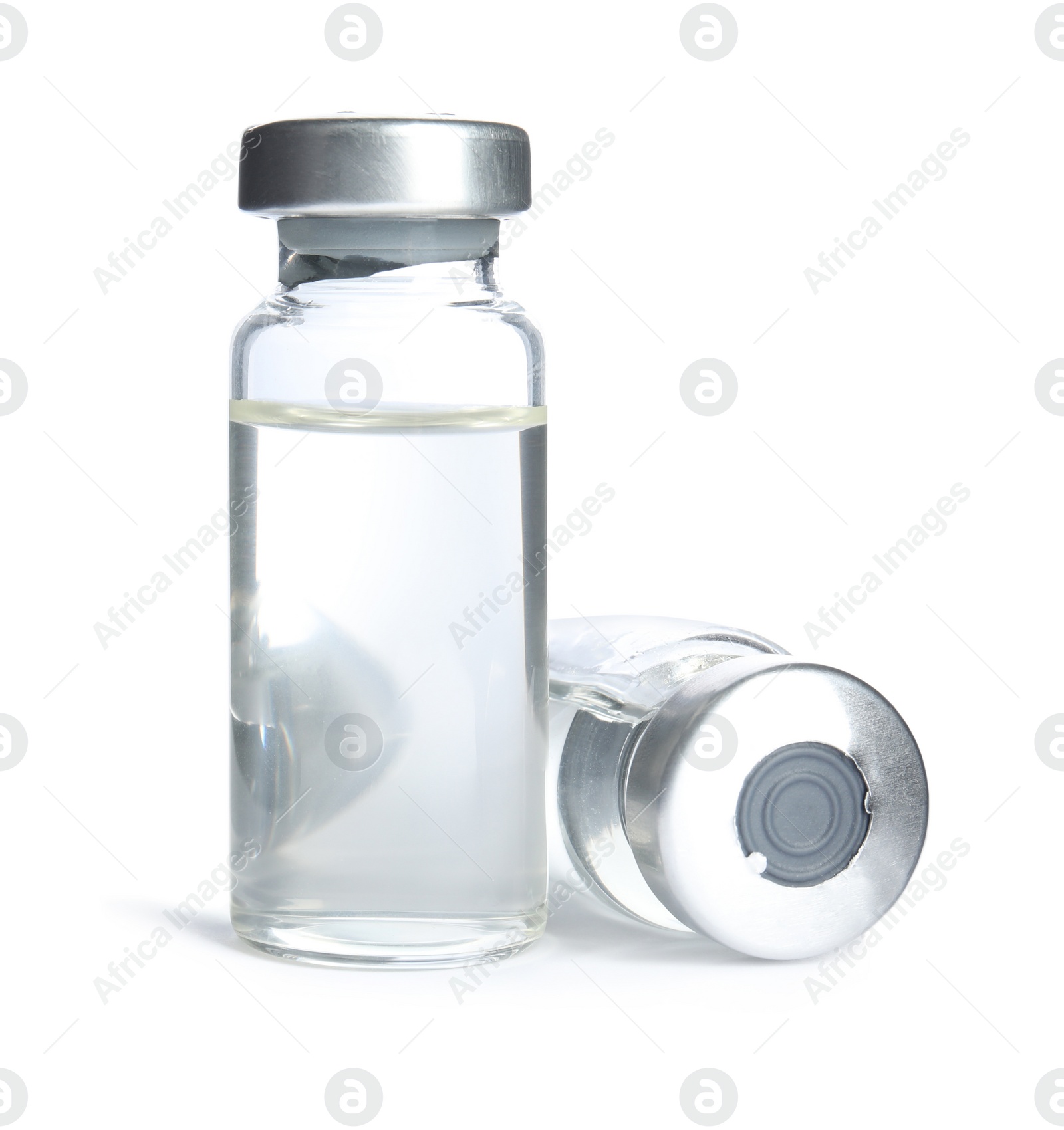 Photo of Vials with medication on white background. Vaccination and immunization