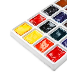 Photo of Plastic palette with colorful paints on white background