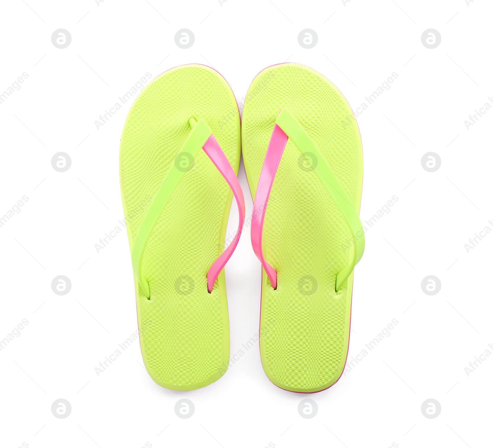 Photo of Pair of stylish green flip flops isolated on white, top view. Beach object