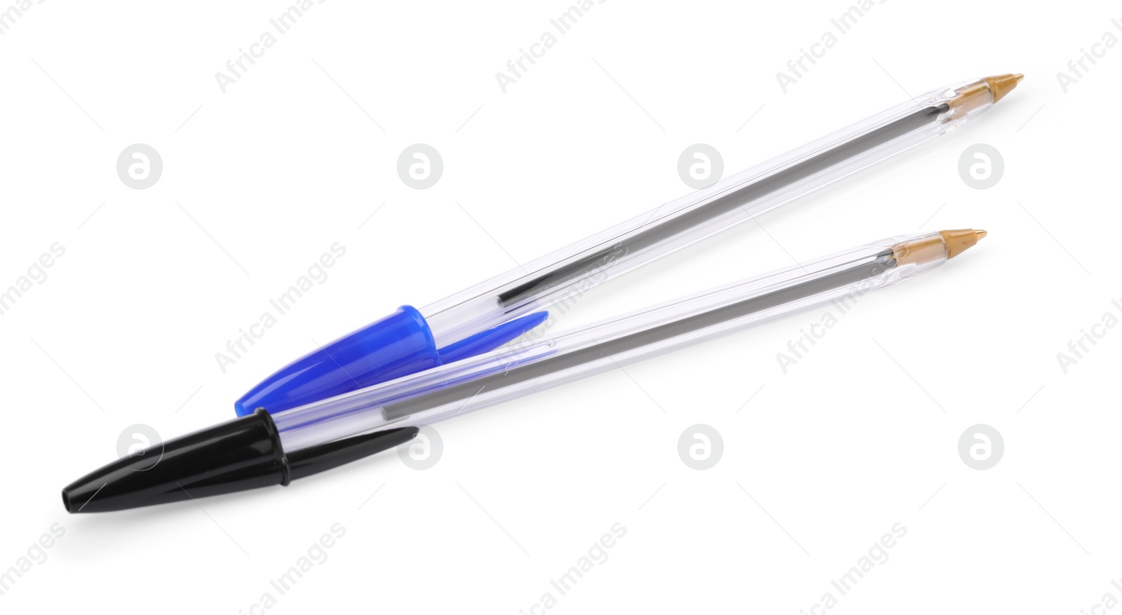 Photo of New black and blue pens isolated on white