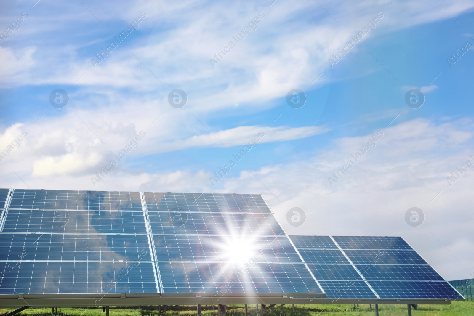 Image of Solar panels outdoors on sunny day. Alternative energy source