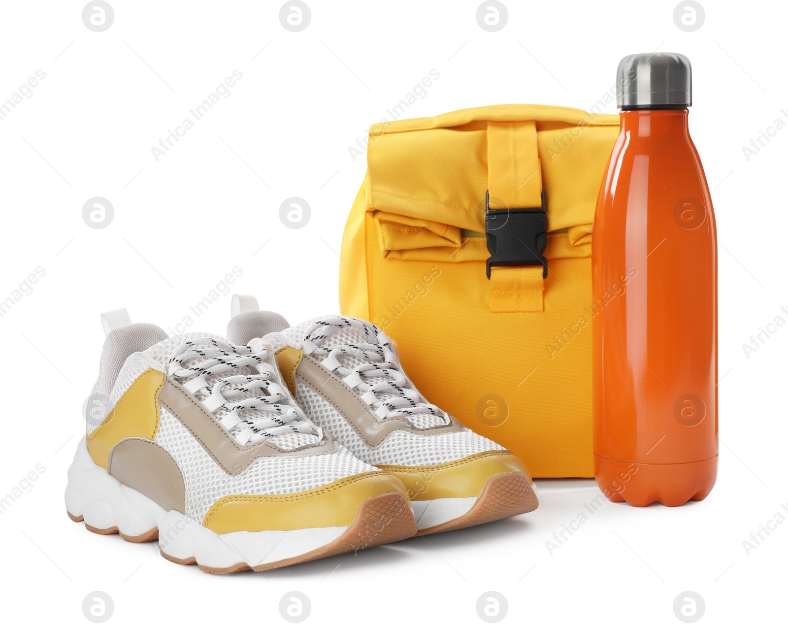 Photo of Stylish shoes, backpack and bottle of water on white background