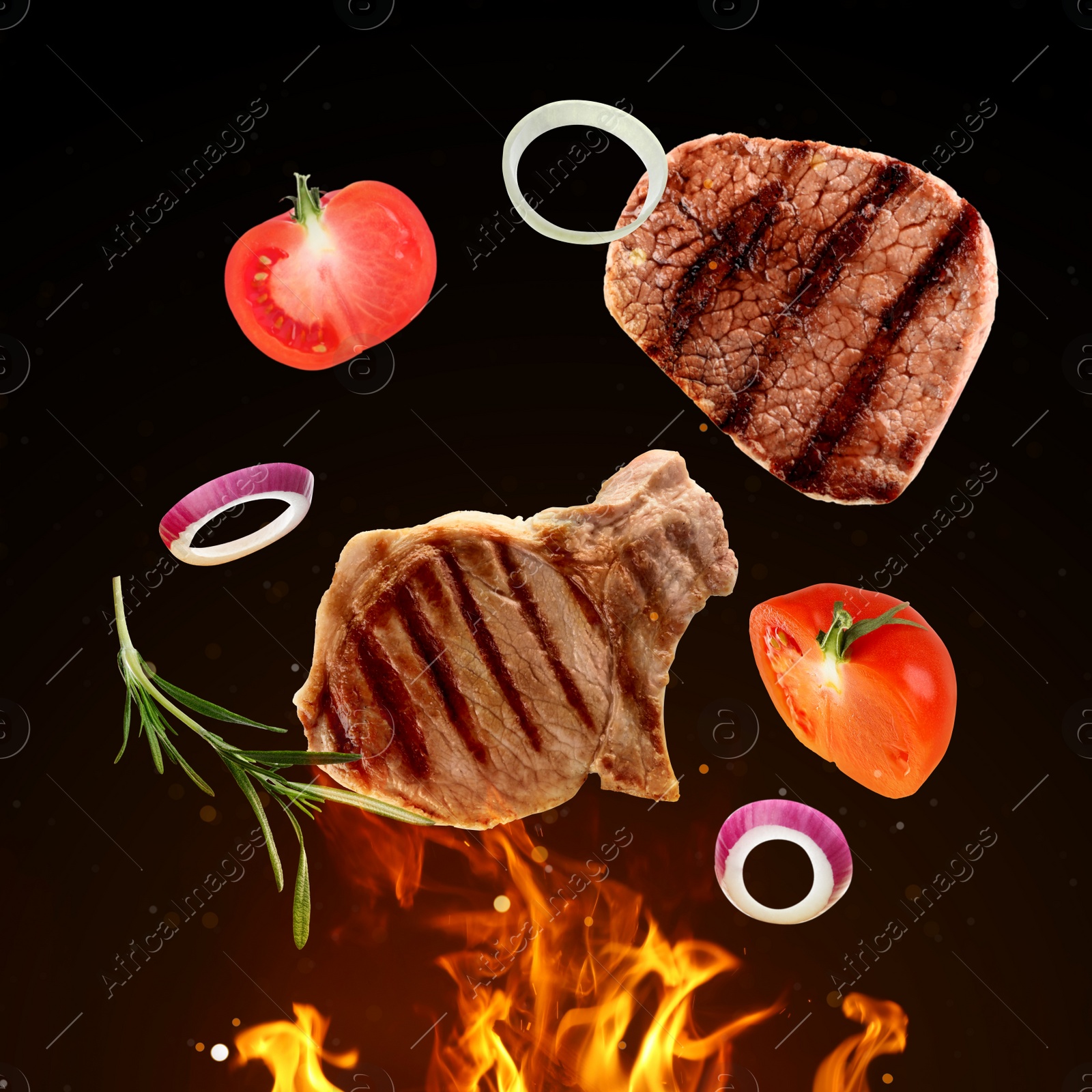 Image of Tasty grilled meat, different vegetables and fire flame on dark background