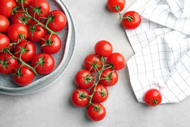 Flat lay composition with ripe tomatoes on table