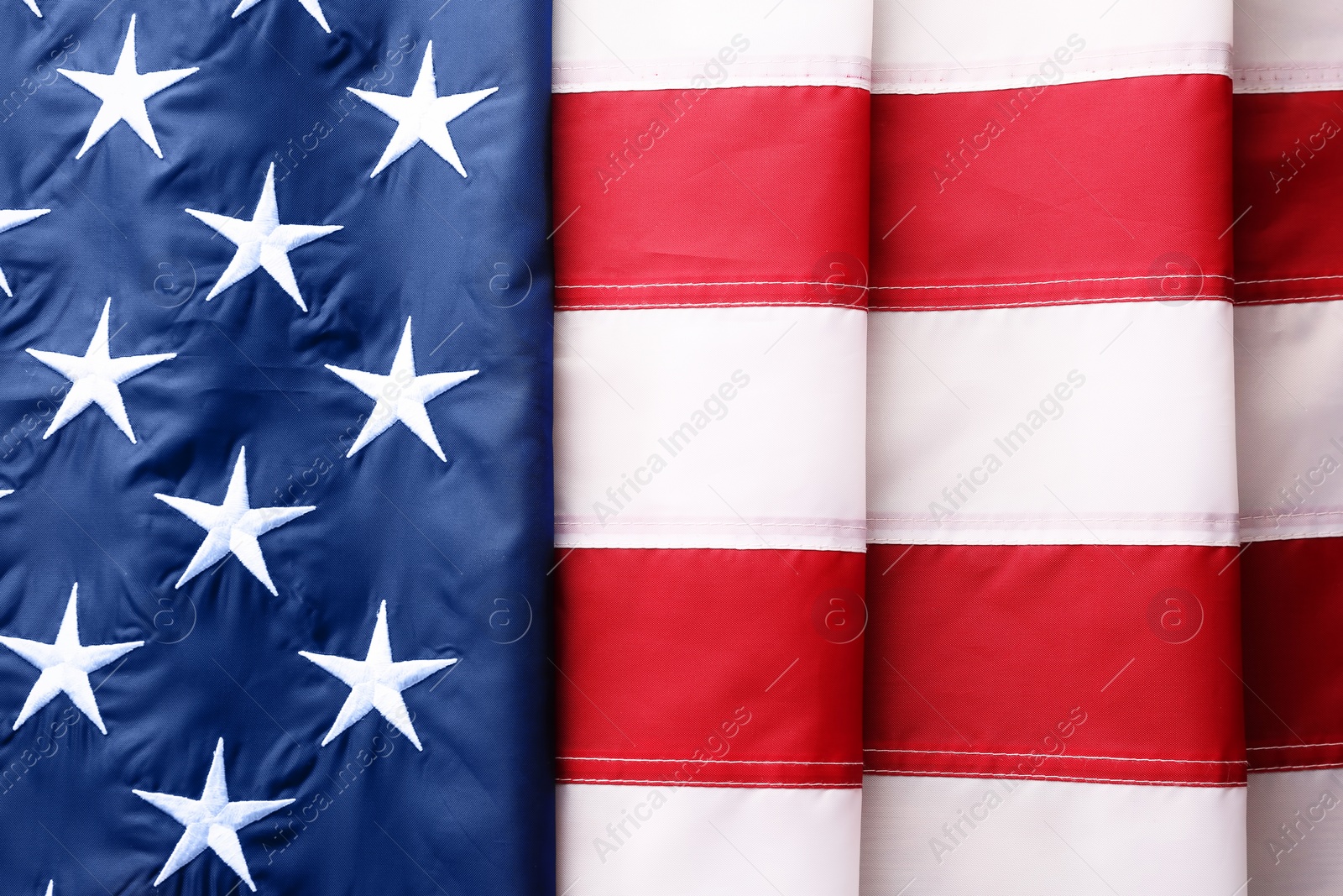 Photo of Folded American flag as background, top view