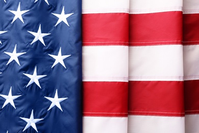 Folded American flag as background, top view