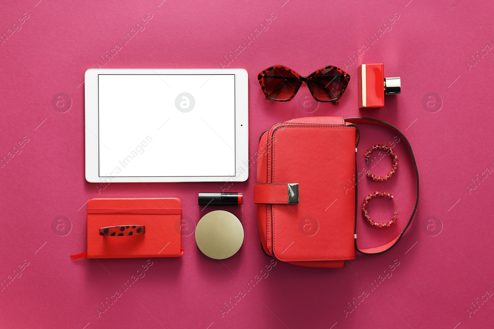 Photo of Flat lay composition with modern tablet on hot pink background. Space for text