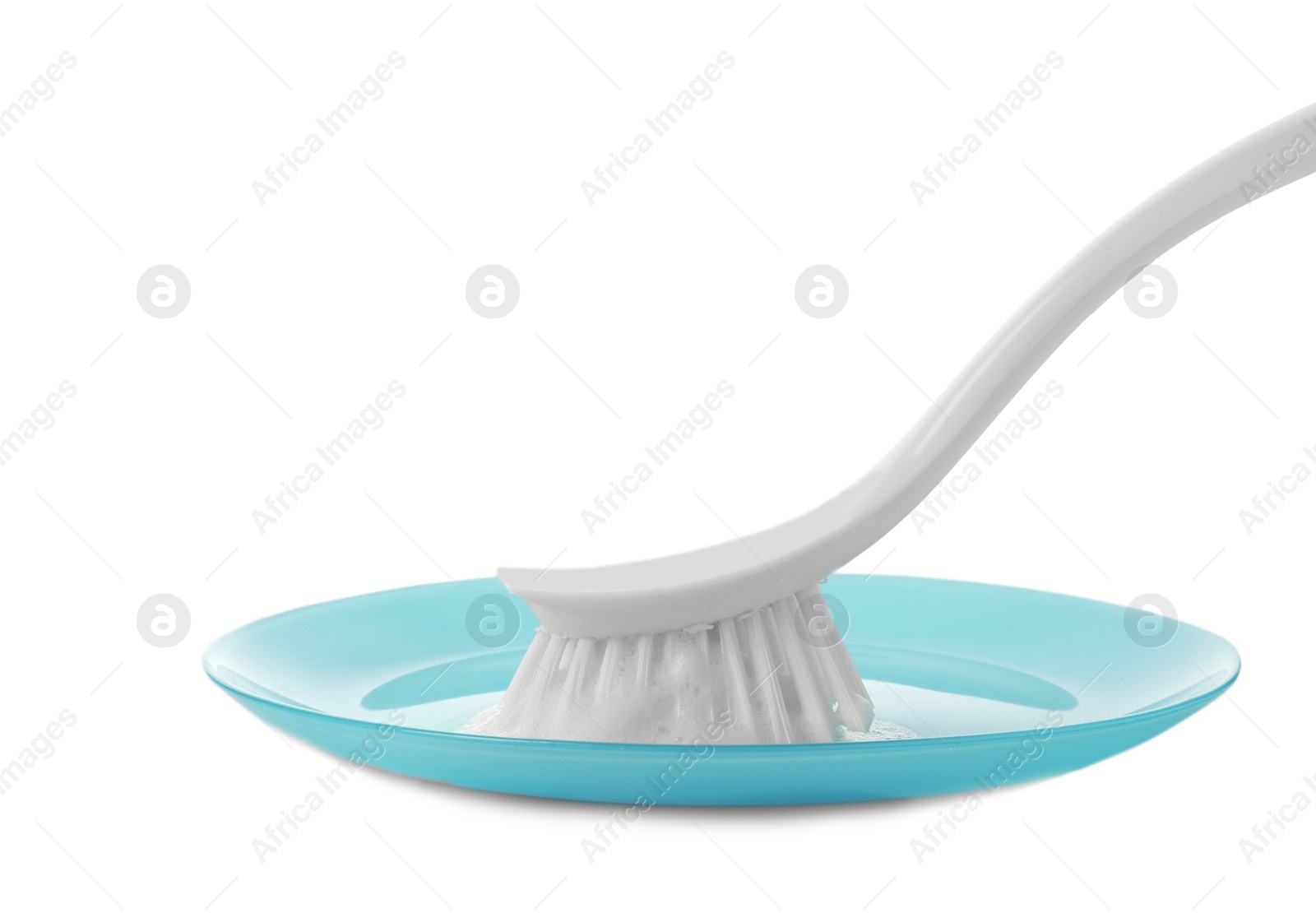 Photo of Cleaning dish with brush on white background