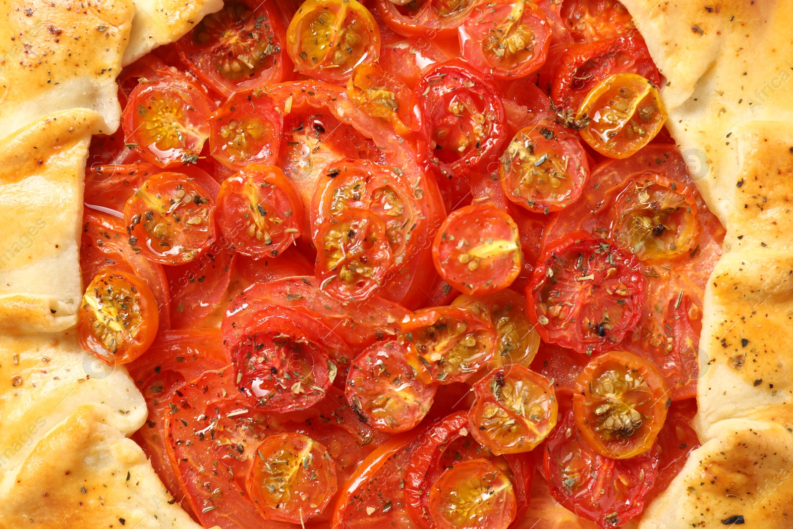 Photo of Tasty tomato galette (Caprese galette) as background, top view