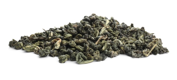 Photo of Pile of dried green tea leaves on white background