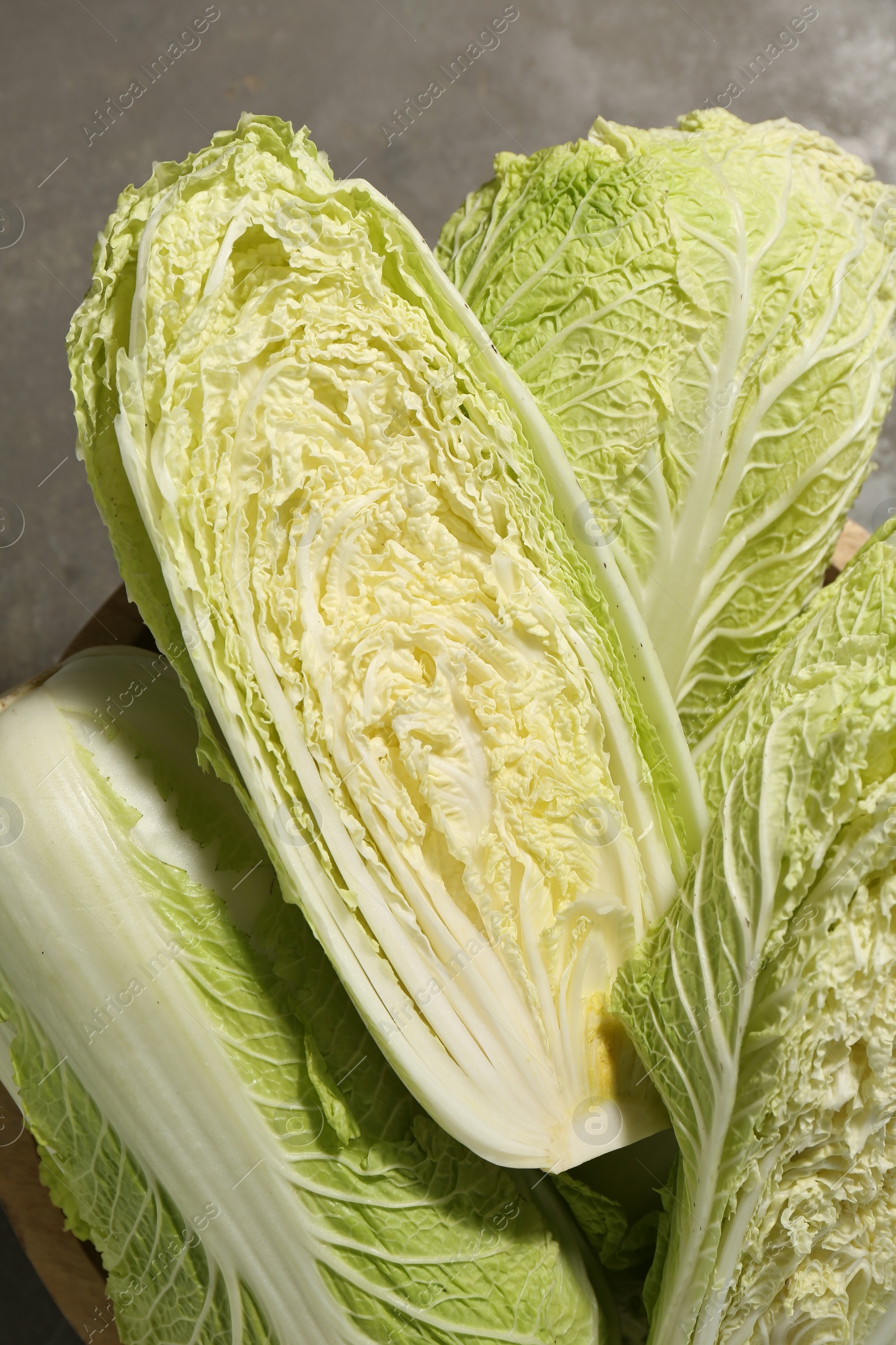 Photo of Fresh ripe Chinese cabbages on table, top view