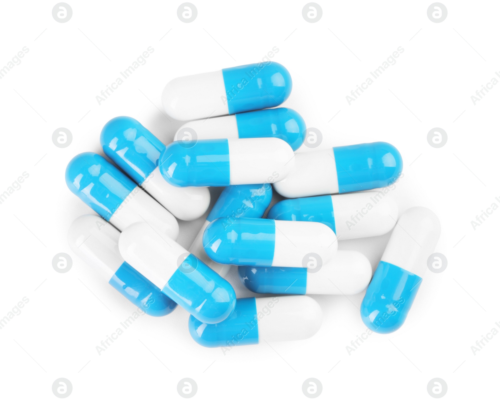 Photo of Pile of antibiotic pills isolated on white, top view