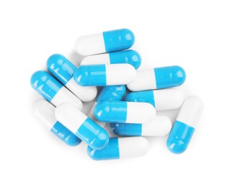 Photo of Pile of antibiotic pills isolated on white, top view