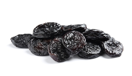 Photo of Heap of tasty prunes on white background. Dried fruit as healthy snack