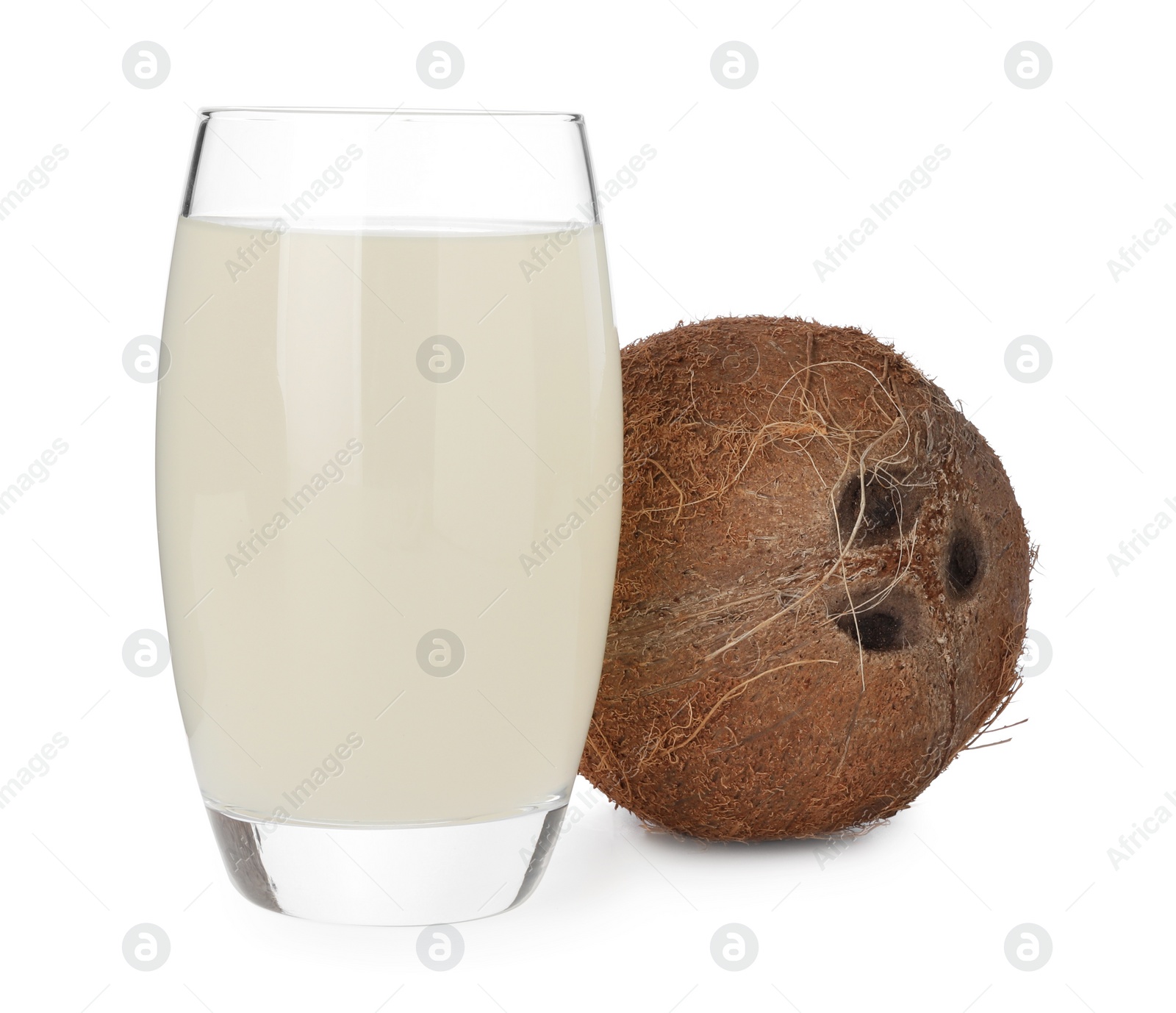 Photo of Glass of coconut water and nut isolated on white