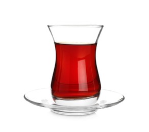 Photo of Glass with traditional Turkish tea isolated on white