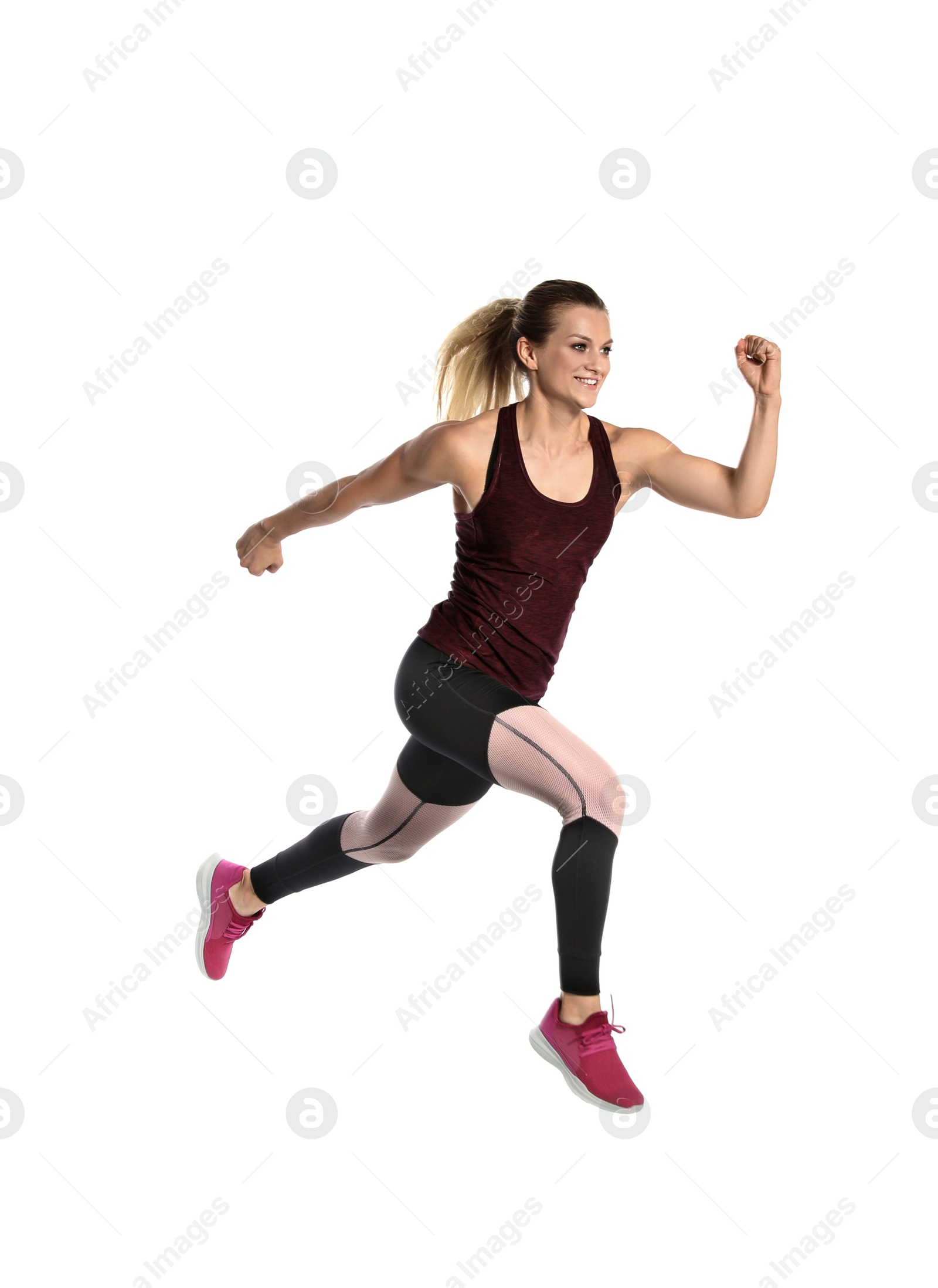 Photo of Sporty young woman running on white background