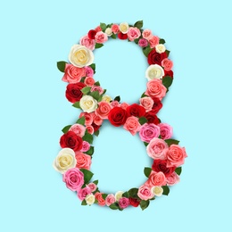 Image of International women's day. Number 8 made of beautiful flowers on pale cyan background, top view