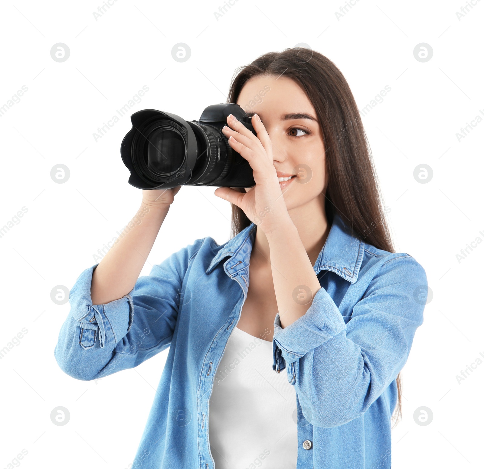 Photo of Female photographer with camera on light background