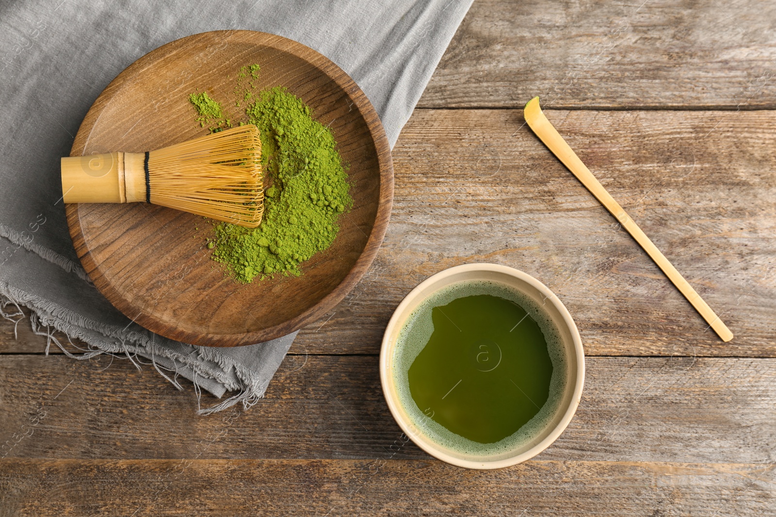 Photo of Flat lay composition with matcha tea on wooden background