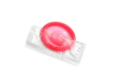 Photo of Torn condom package isolated on white, top view. Safe sex