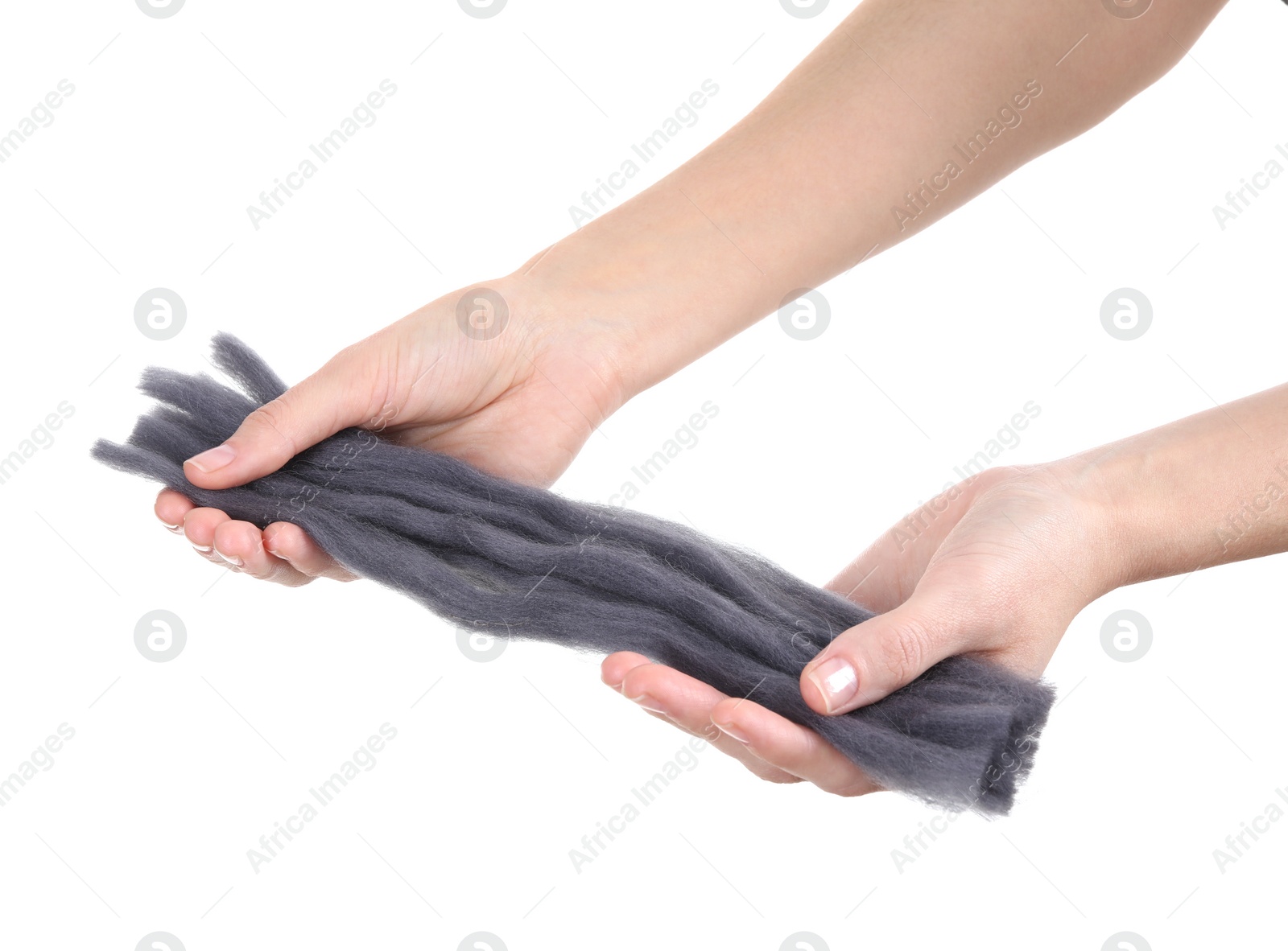 Photo of Woman holding grey felting wool on white background, closeup