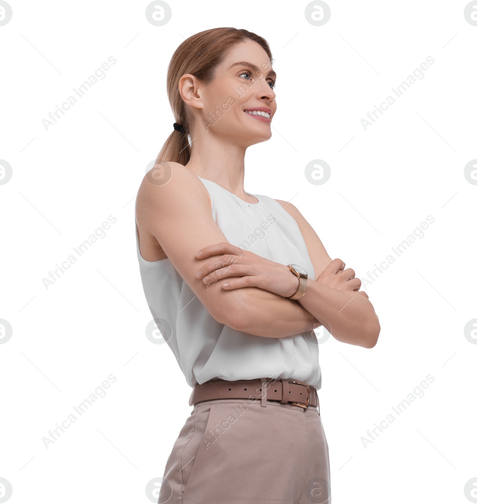 Photo of Beautiful happy businesswoman crossing arms on white background