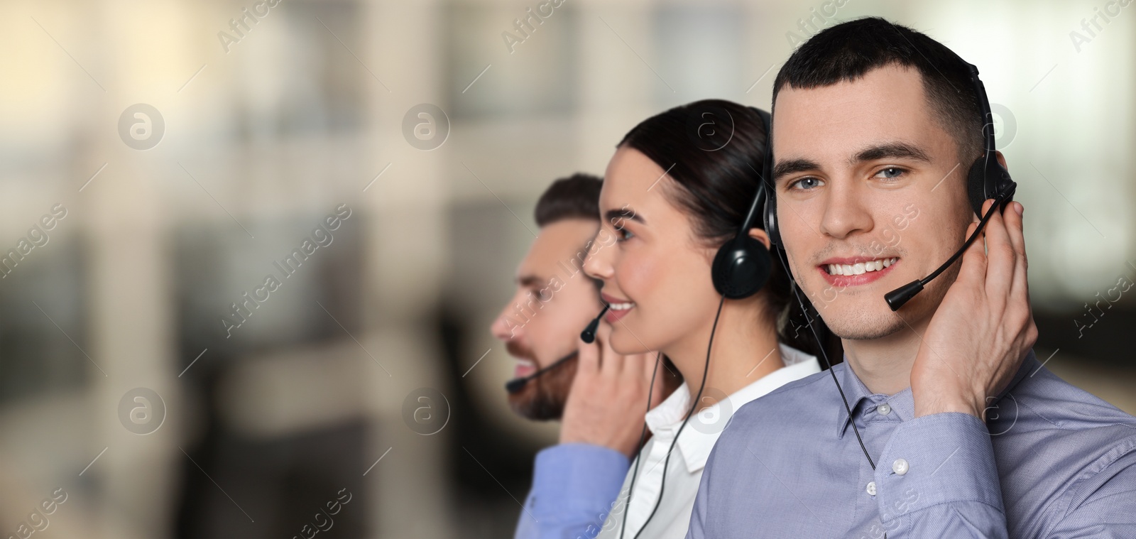 Image of Hotline operators with headsets in office, space for text. Banner design