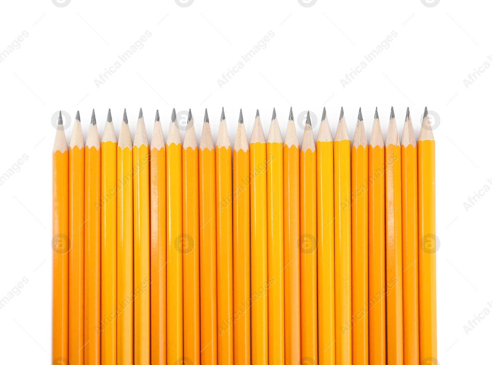 Photo of Many sharp pencils isolated on white, top view