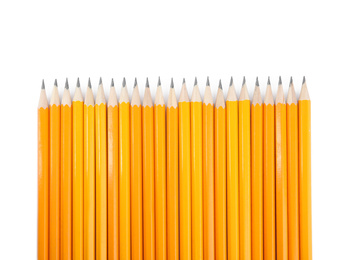 Photo of Many sharp pencils isolated on white, top view