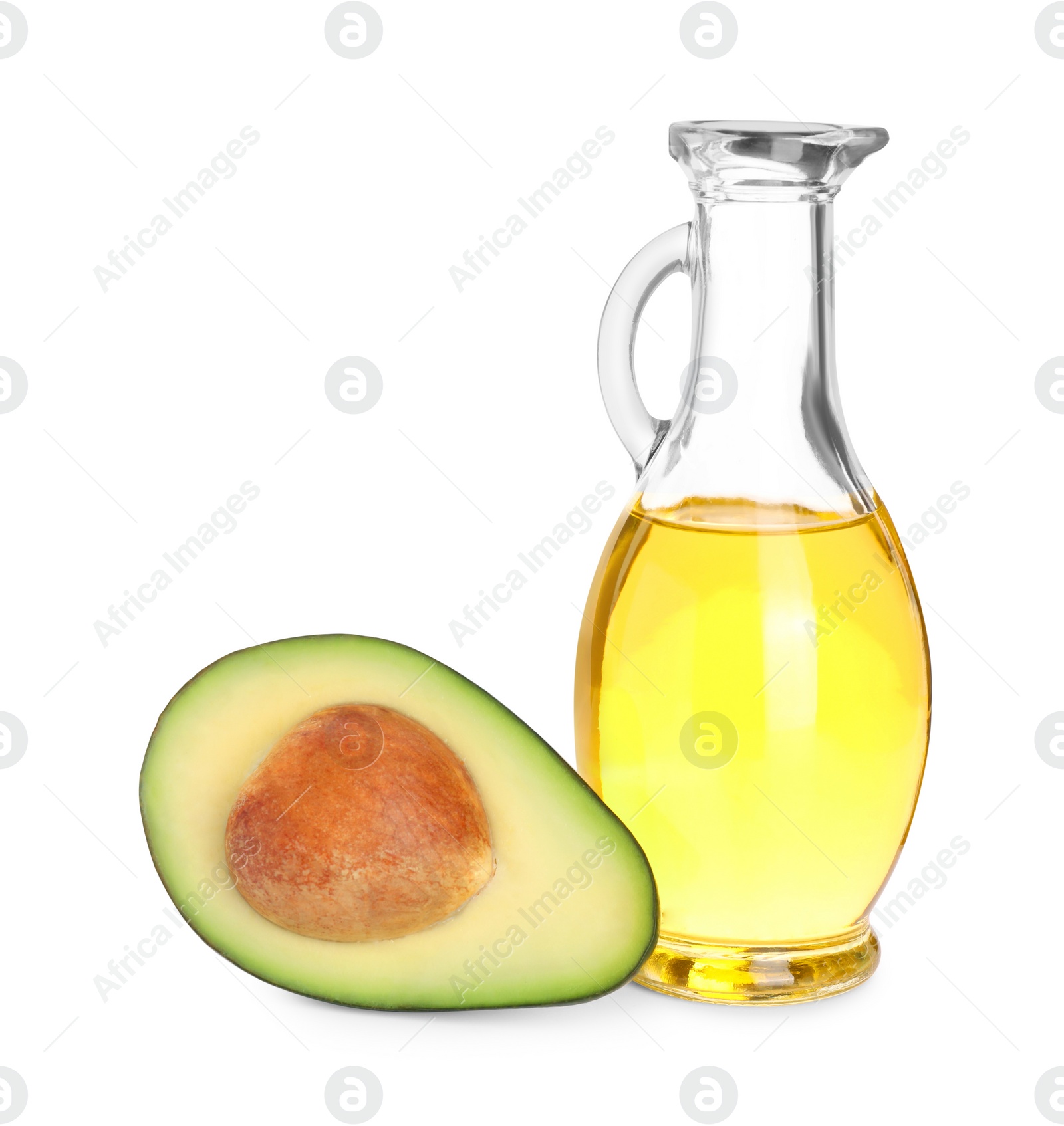 Photo of Cooking oil and half of fresh avocado isolated on white