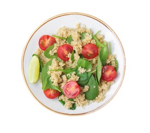 Photo of Plate of delicious quinoa salad with tomatoes and spinach leaves isolated on white, top view