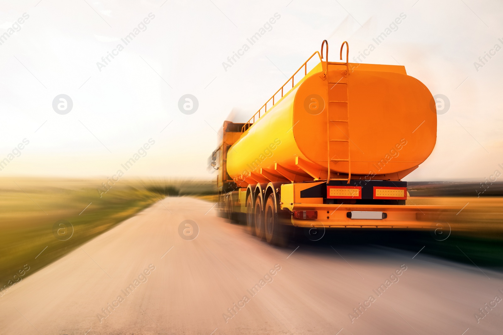 Image of Logistics concept. Truck on country road, motion blur effect 