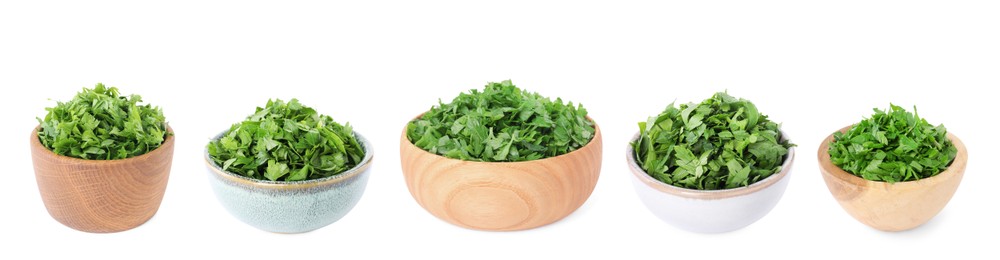 Image of Set with cut parsley in bowls isolated on white