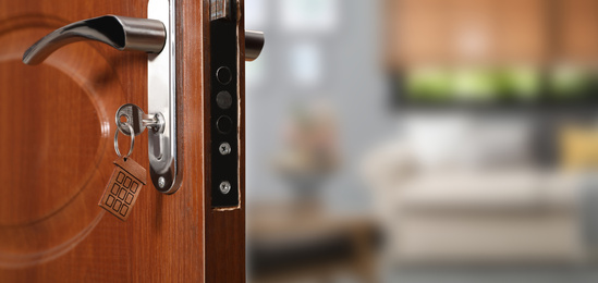 Closeup view of door with key open into room