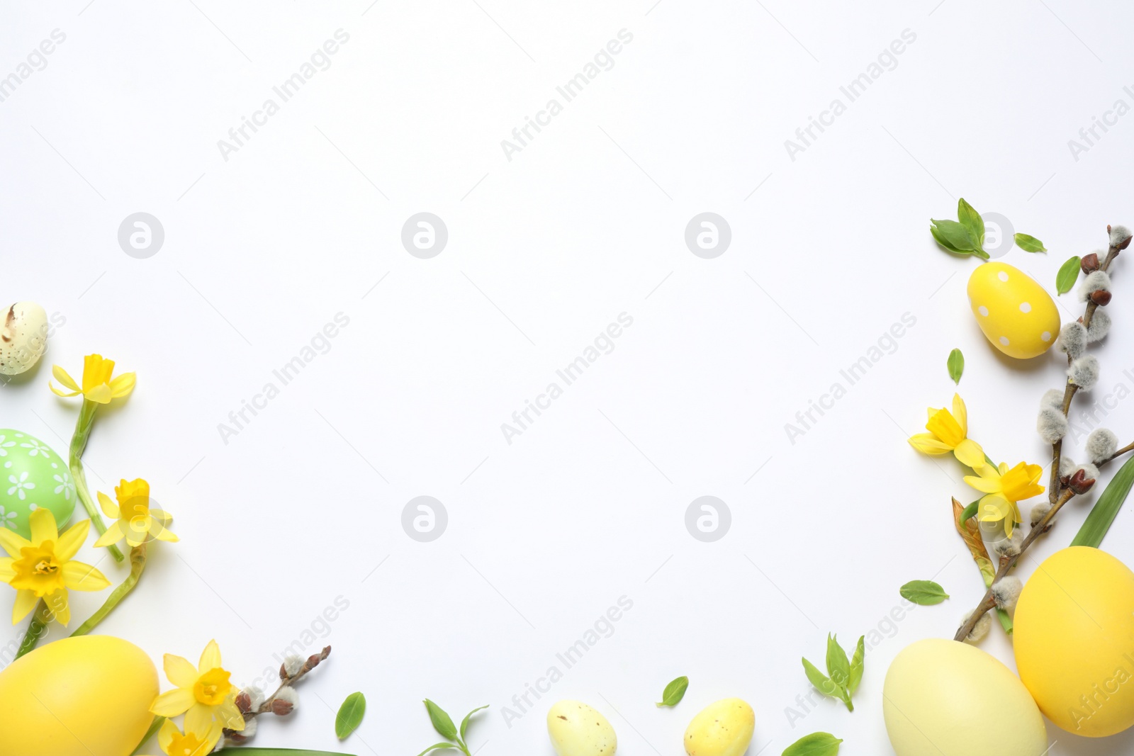 Photo of Flat lay composition with Easter eggs on white background. Space for text